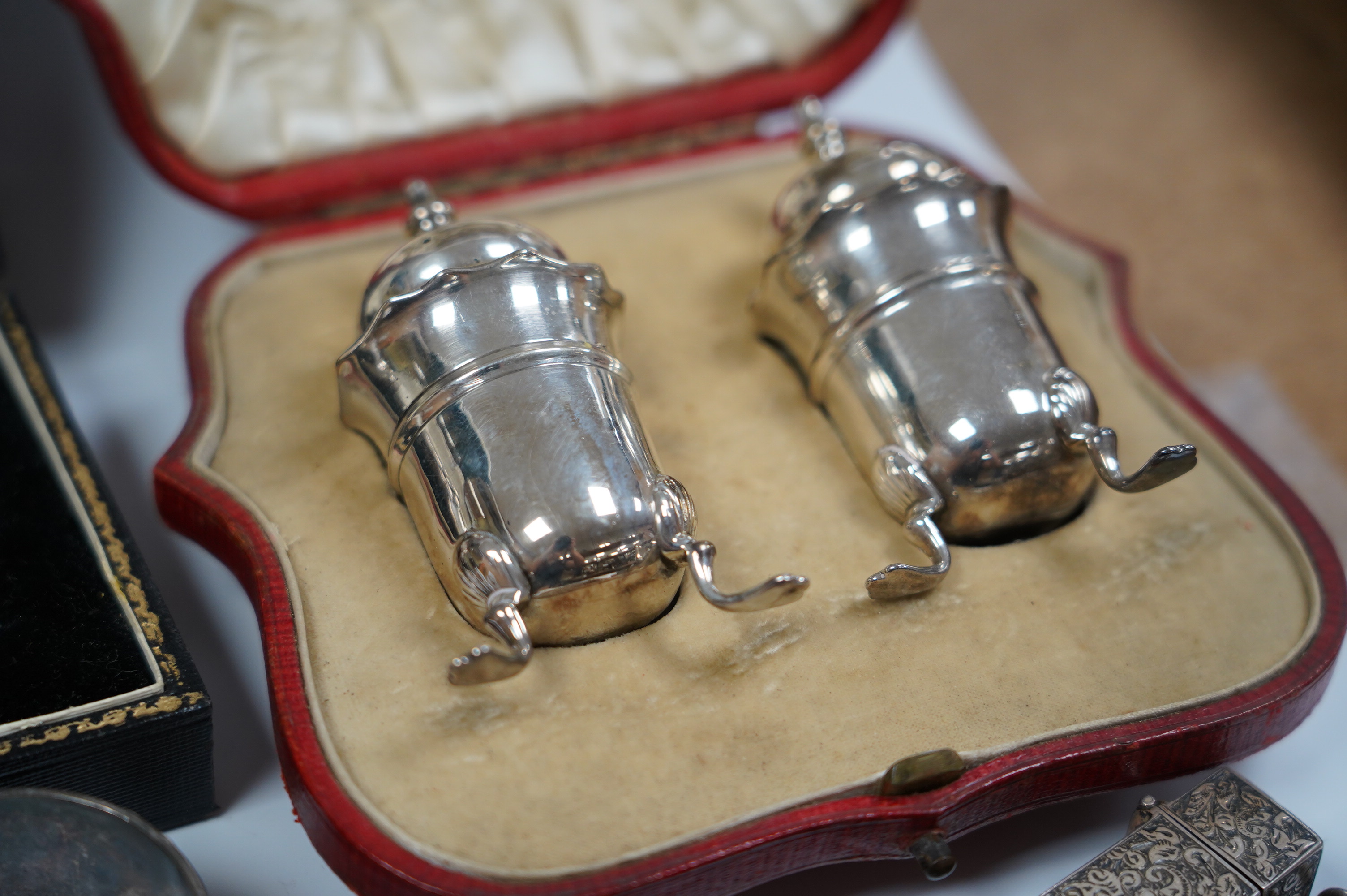 Sundry small silver including two cased condiment sets, a card case, vesta, scent flask, etc. and a plated evening bag. Condition - poor to fair